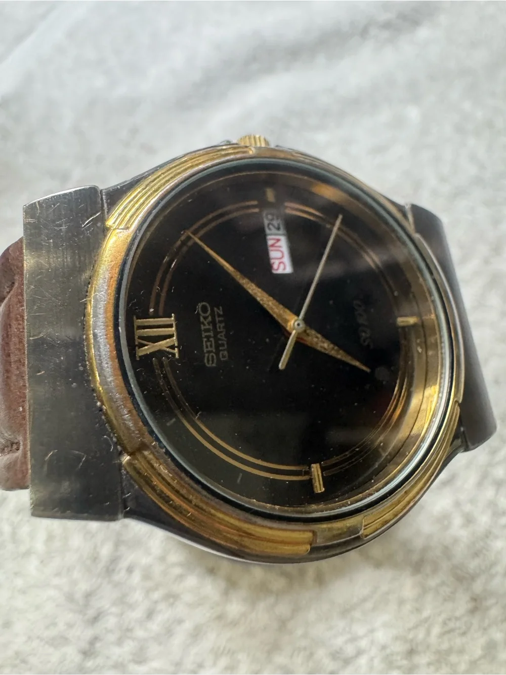 Seiko Black Dial Watch with Gold Accents